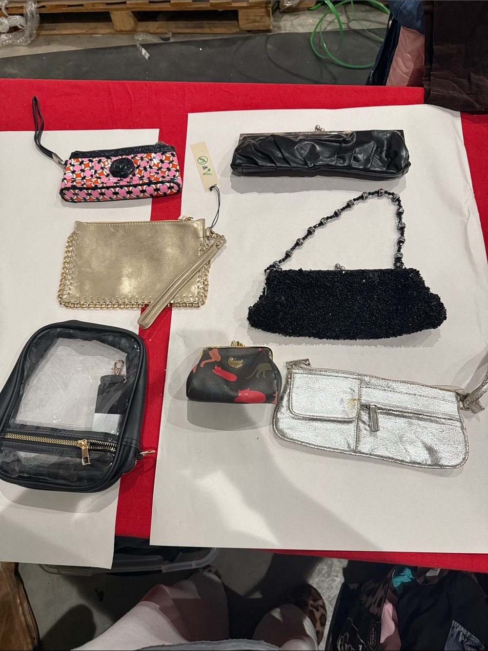 Bundle of seven wristlets and clutches